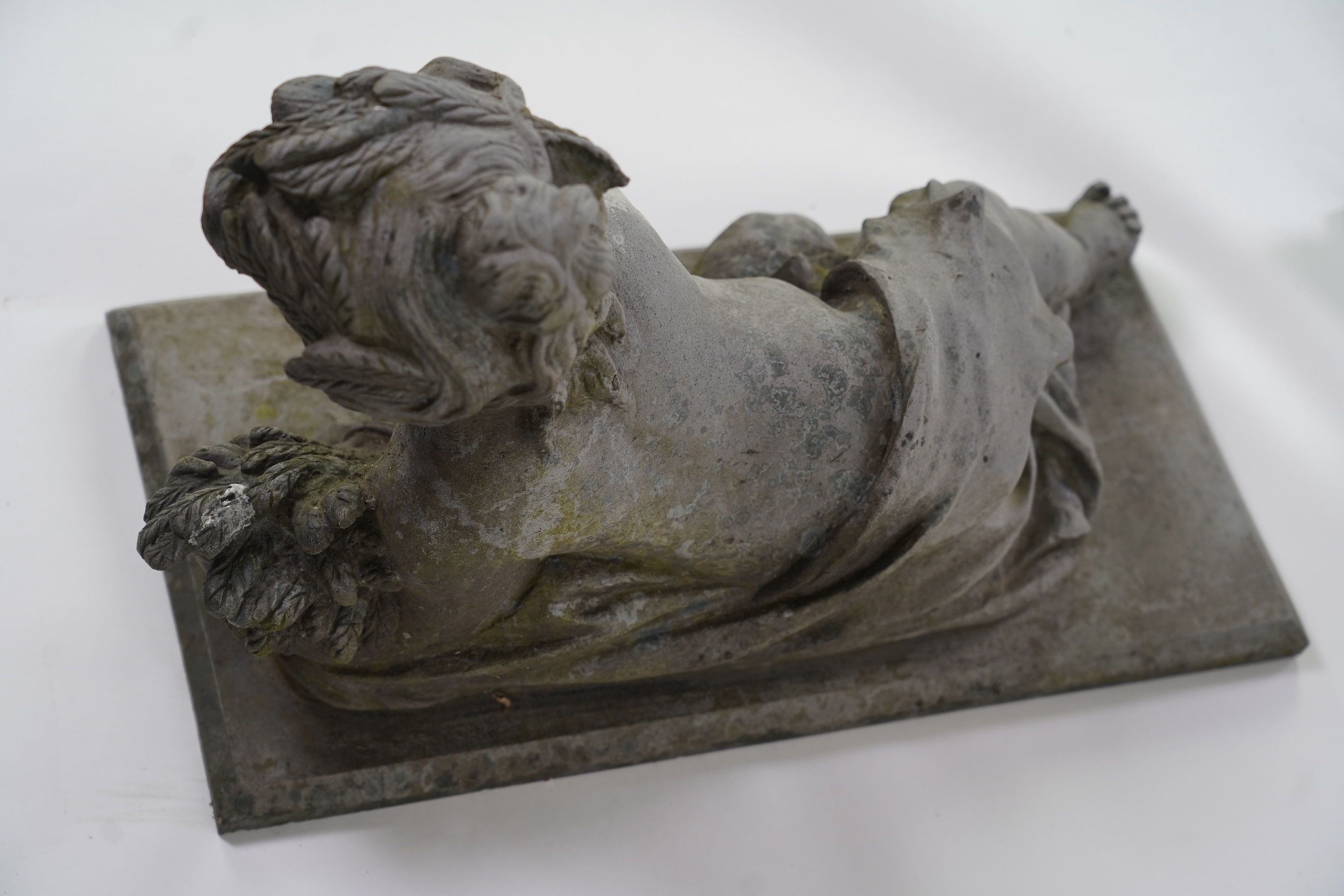 A pair of simulated lead garden sculptures, Emblematic of Summer and Autumn